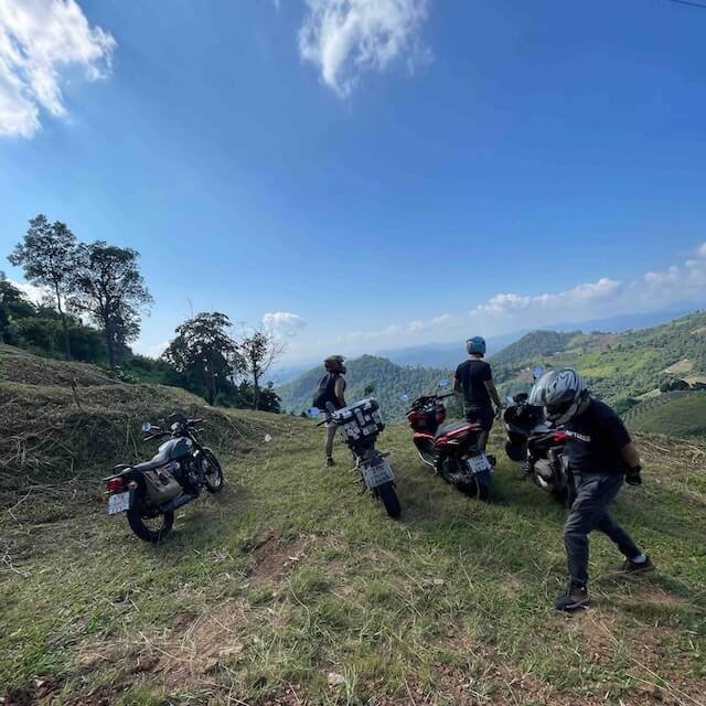 Friends in Chiang Mai scooter riding